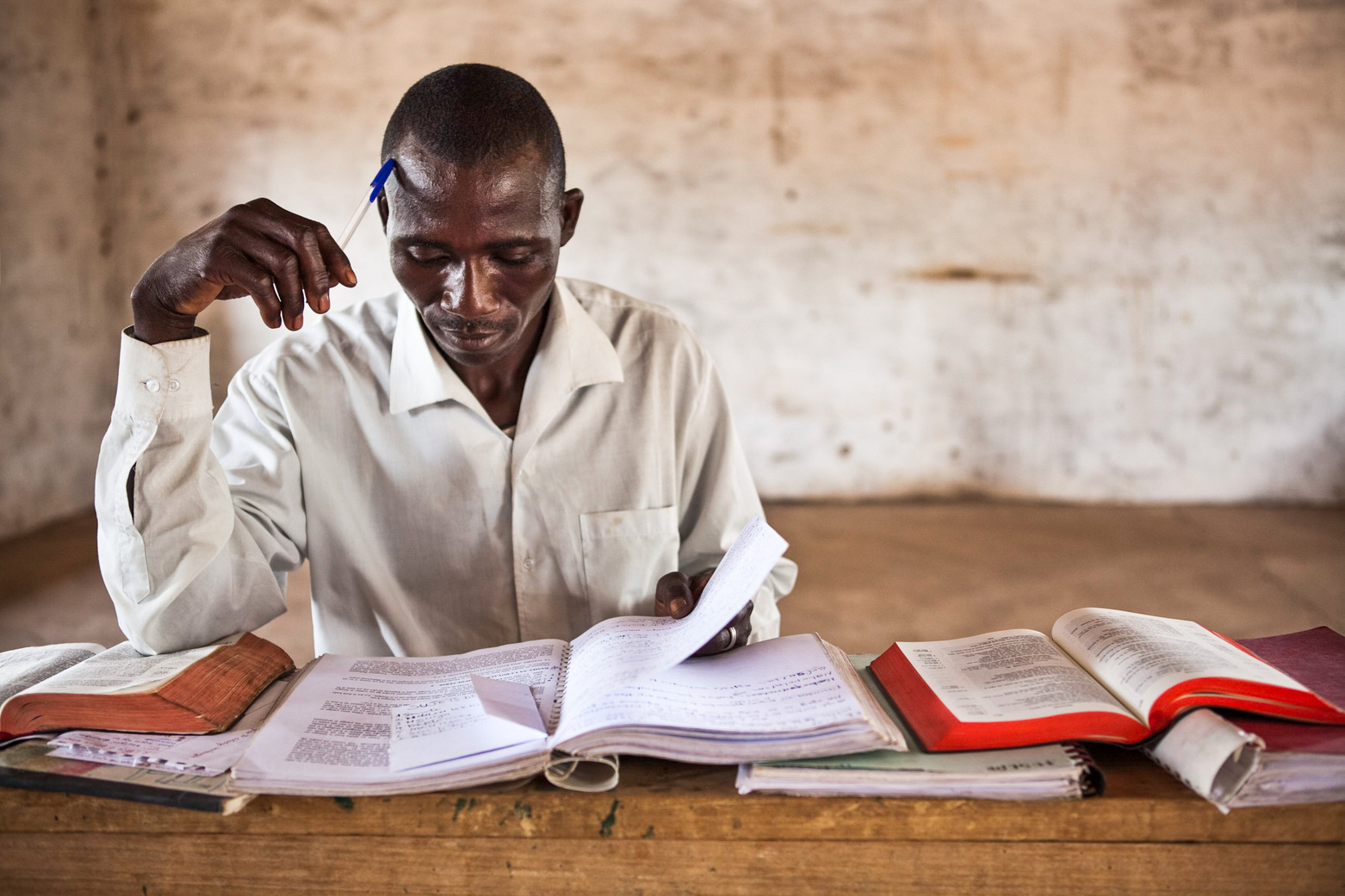 man reading the bible
