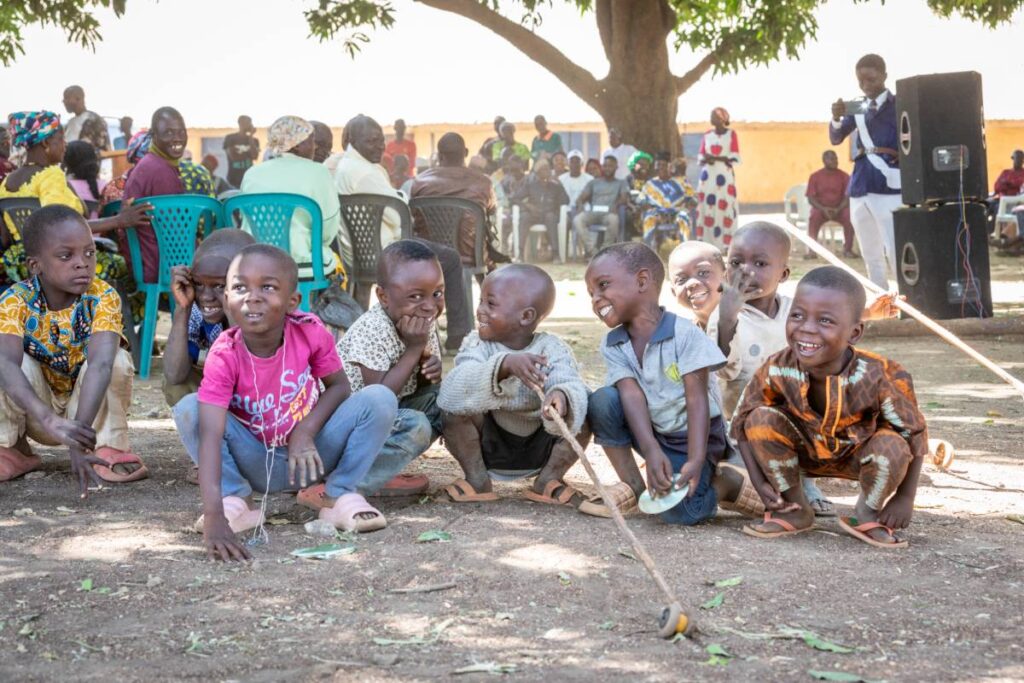 Group of Nigeran kids playing at a celebration.